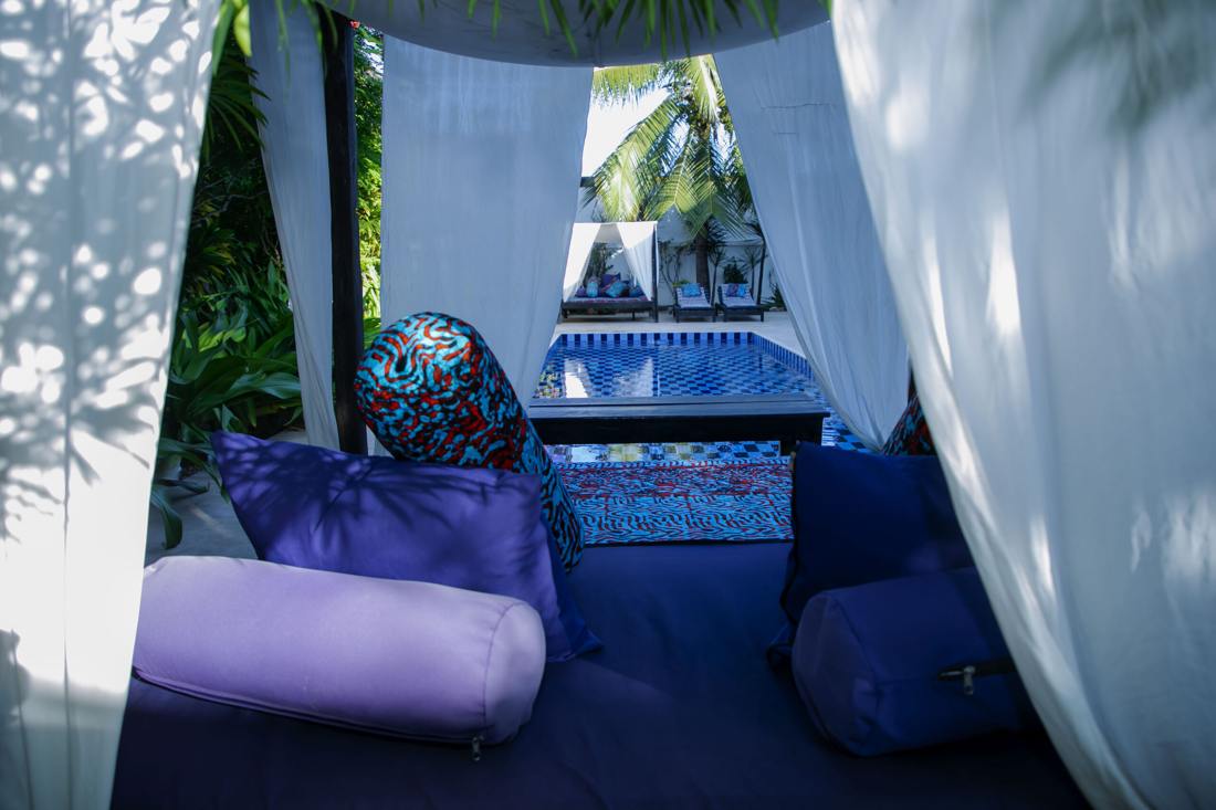 Cushioned daybed in the shade